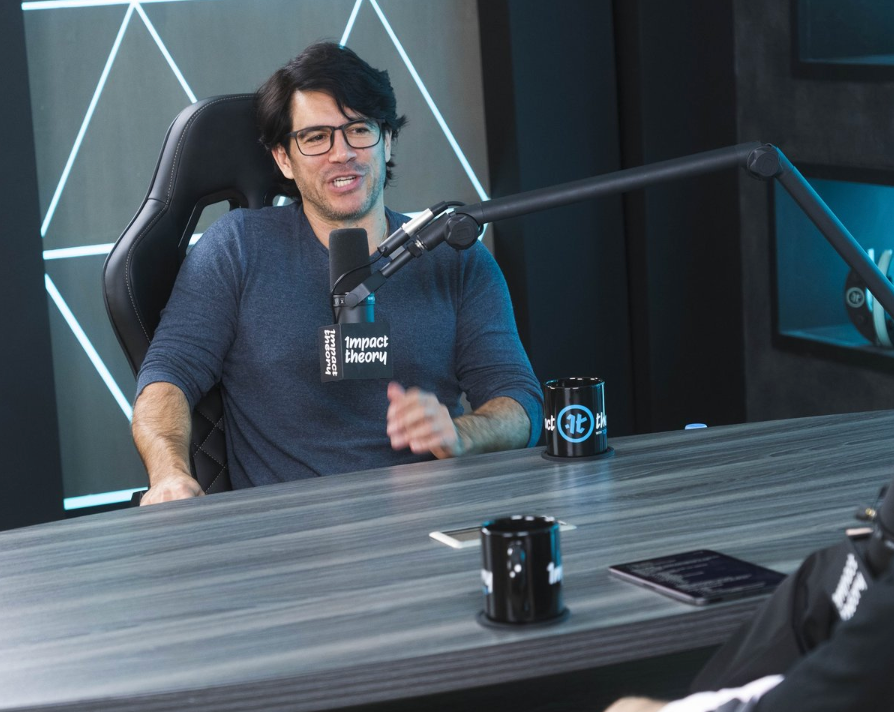 Tai Lopez reading in his private library