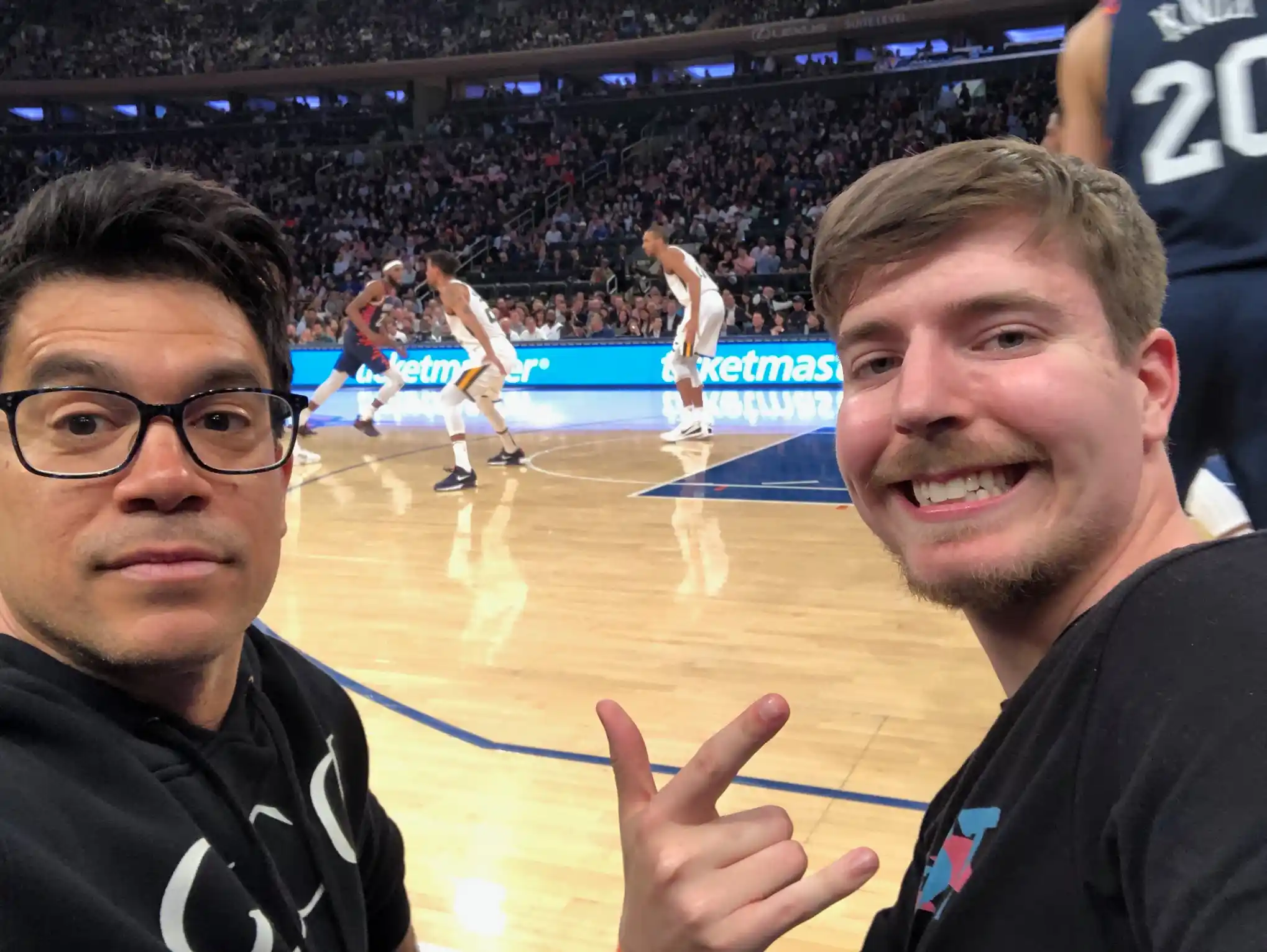 Tai Lopez presenting at the boardroom table with entrepreneurs